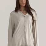Muse Long PJs — Dusk: Relaxed-fit, long-sleeve beige pajama set with white piping detail.