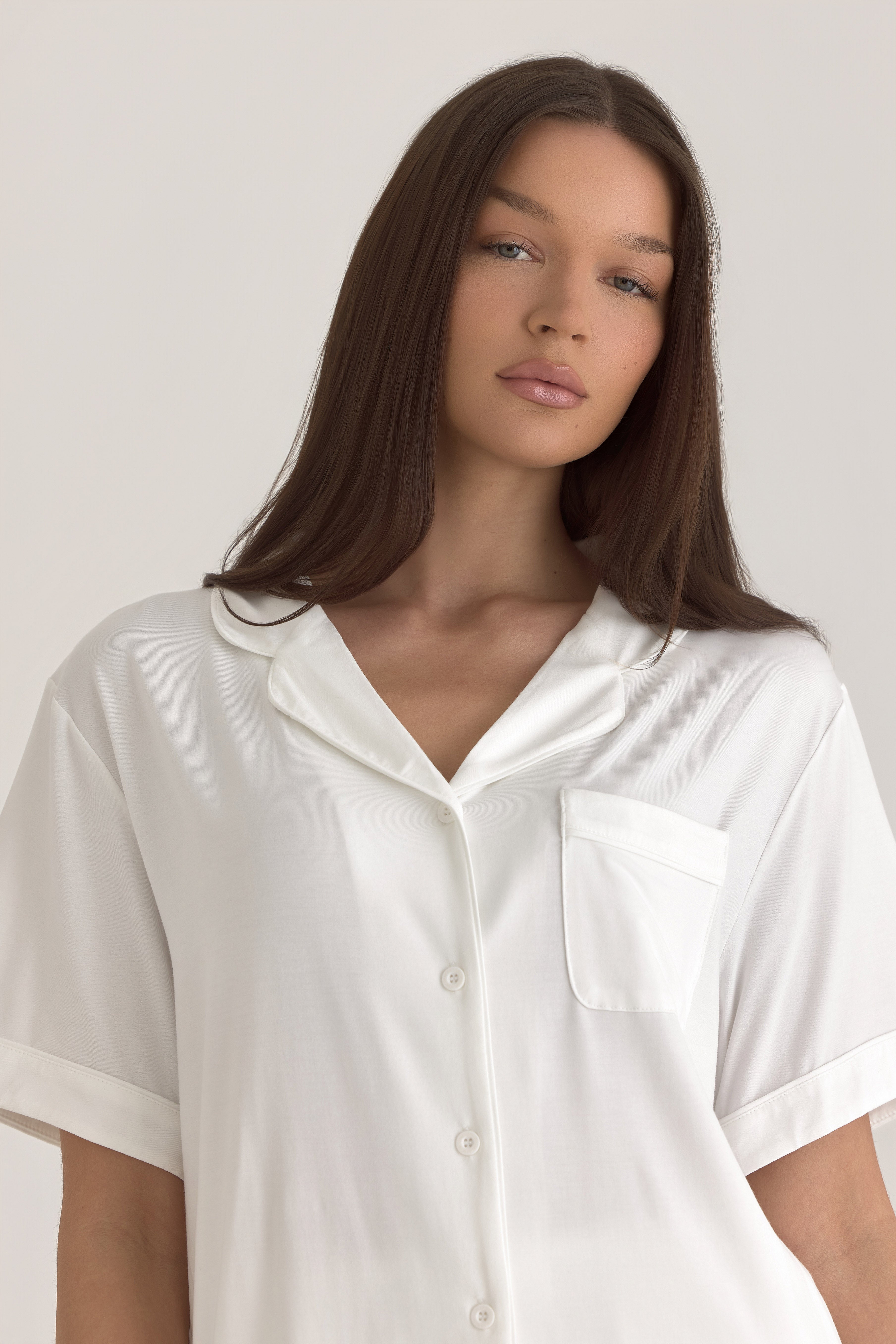 Muse Short PJs — Morning Mist: Women's white short-sleeve pajama set with collared top and button closure.