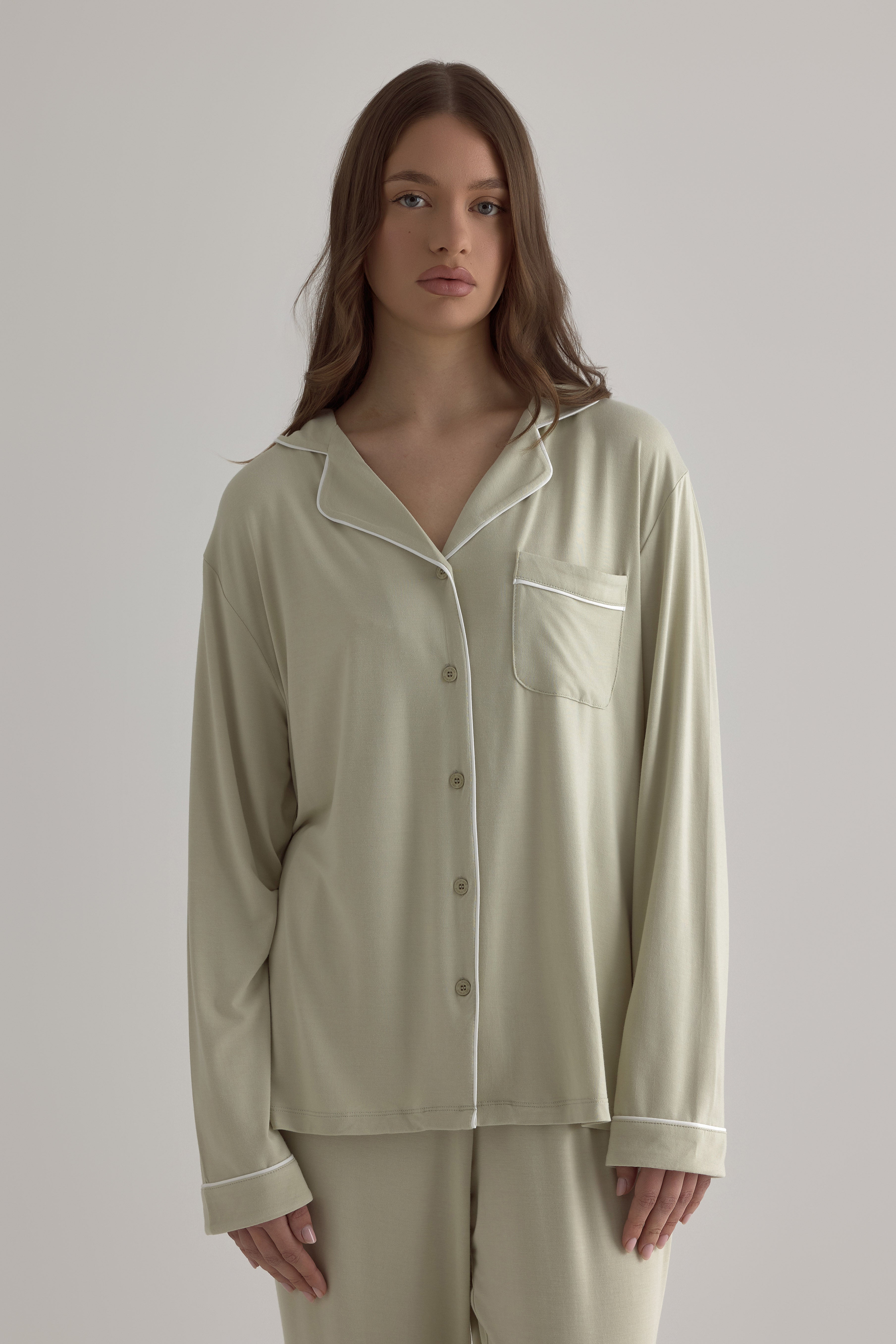 Muse Long PJs — Soft Sage: Women's long-sleeve pajama set in a soft sage green color with white piping detail.