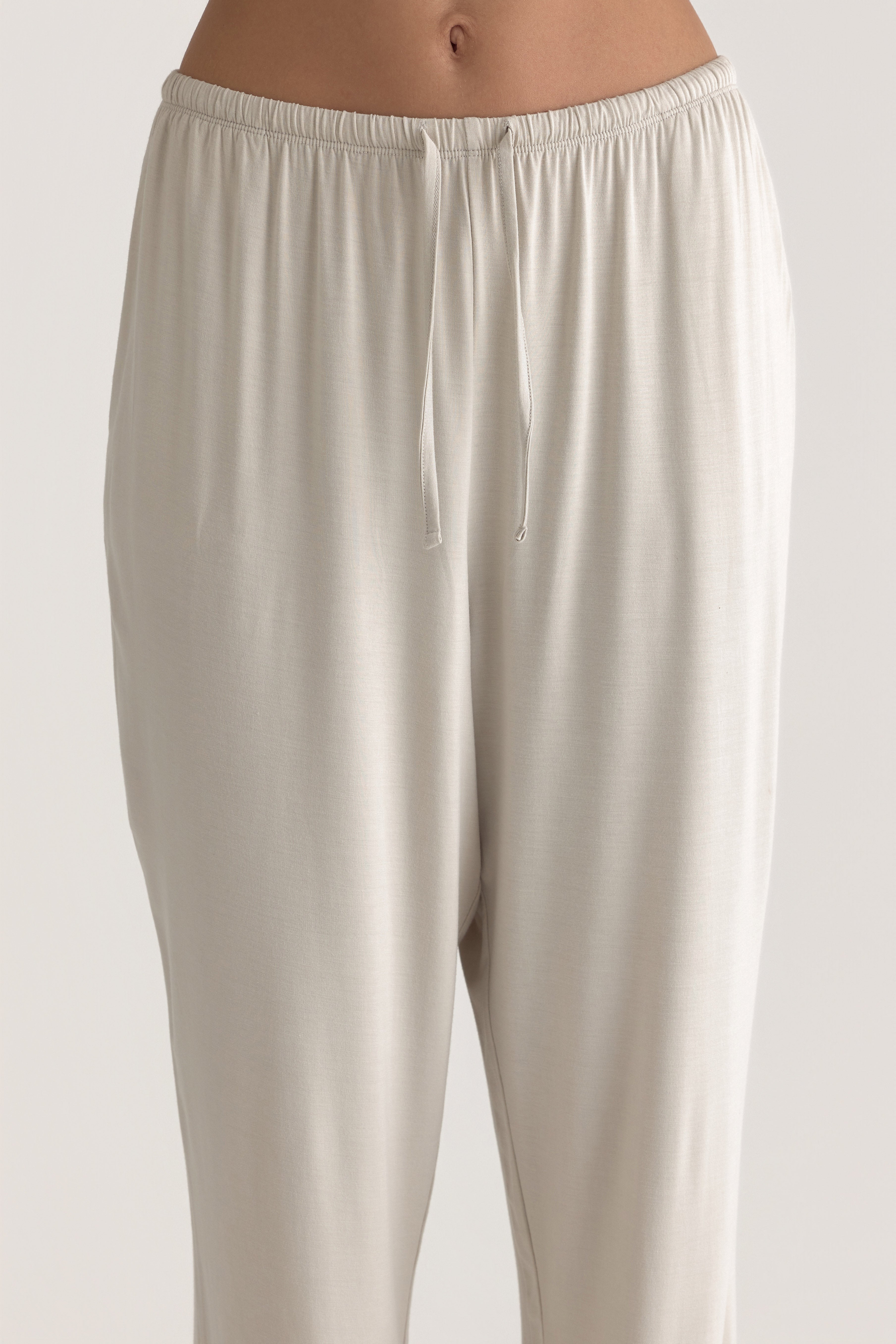 Muse Long PJs — Dusk: Relaxed-fit, light beige pajama pants with drawstring waist.