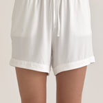 Muse Short PJs — Morning Mist: White women's pajama shorts with drawstring waist and cuffed hems.