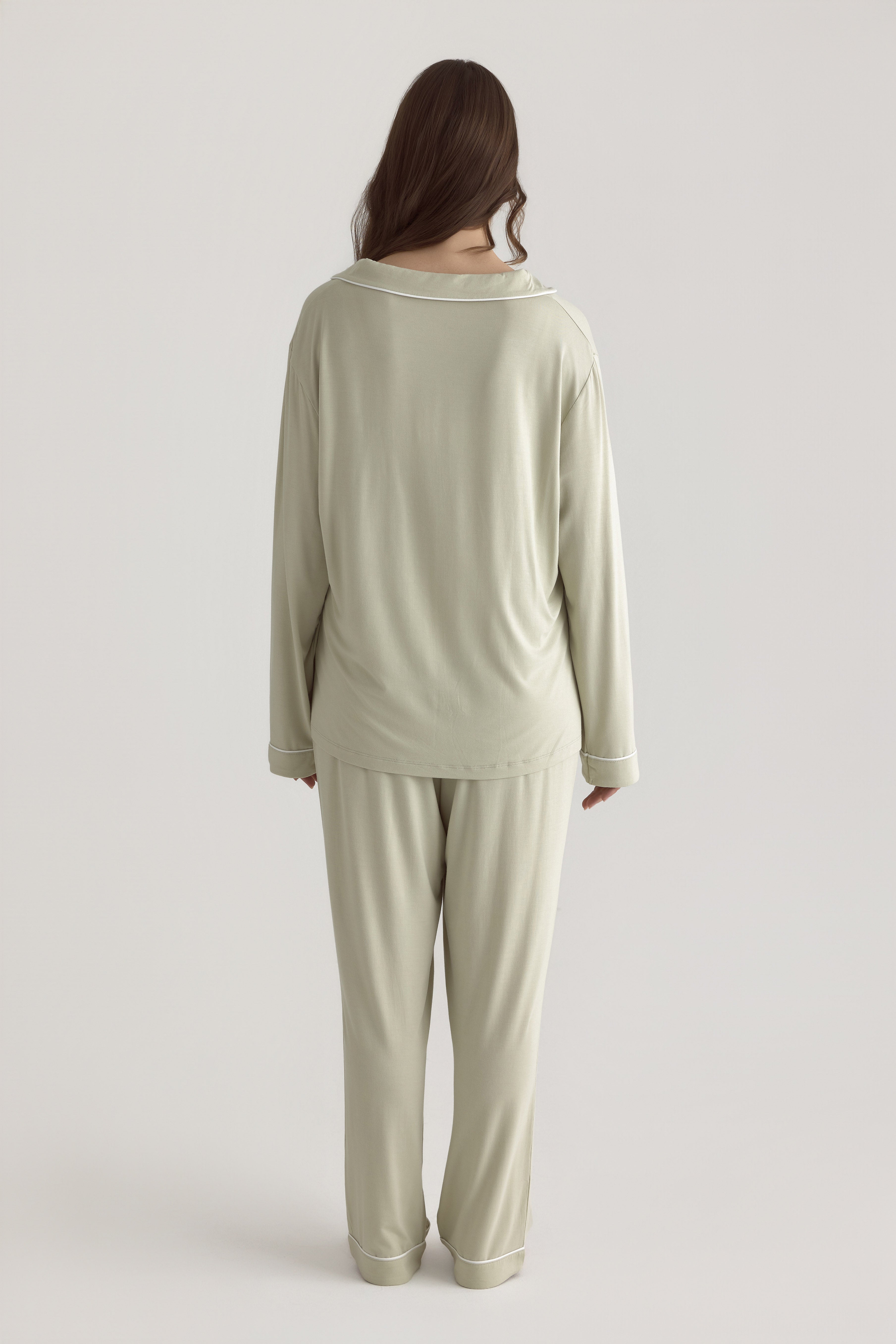 Muse Long PJs in Soft Sage: Women's long-sleeve pajama top and pants set, light green color.